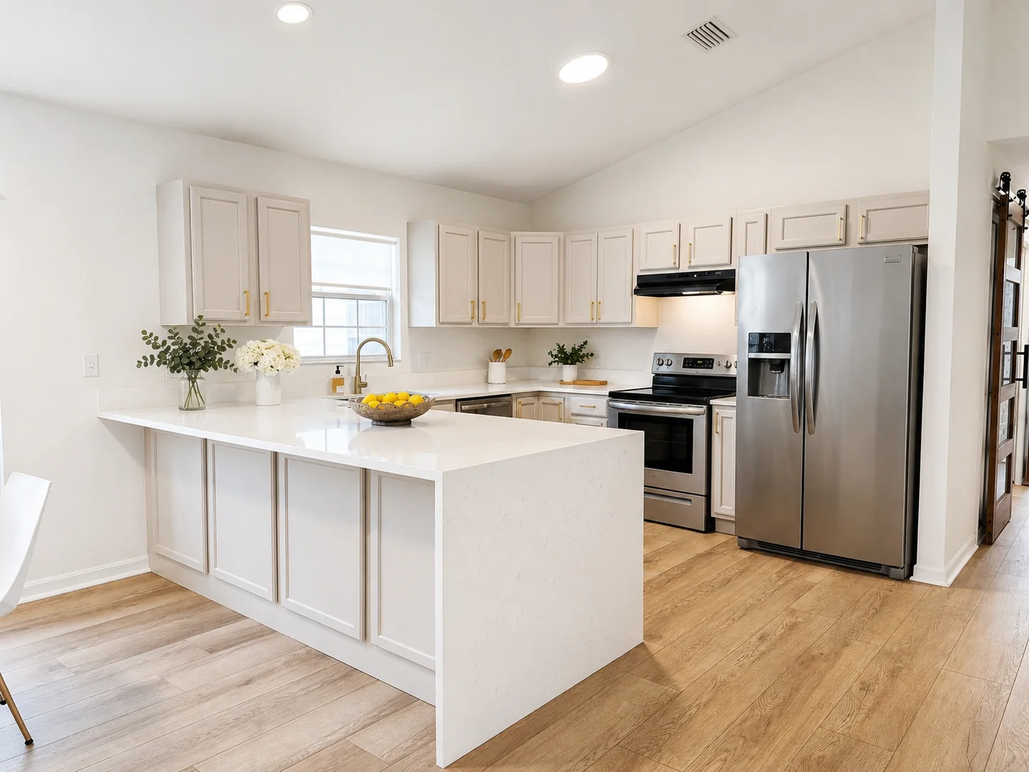 Remodeled kitchen with quartz island